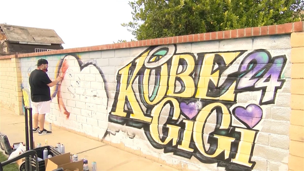 Artist Painting Mural Of Kobe And Gianna Bryant In Coachella Kesq