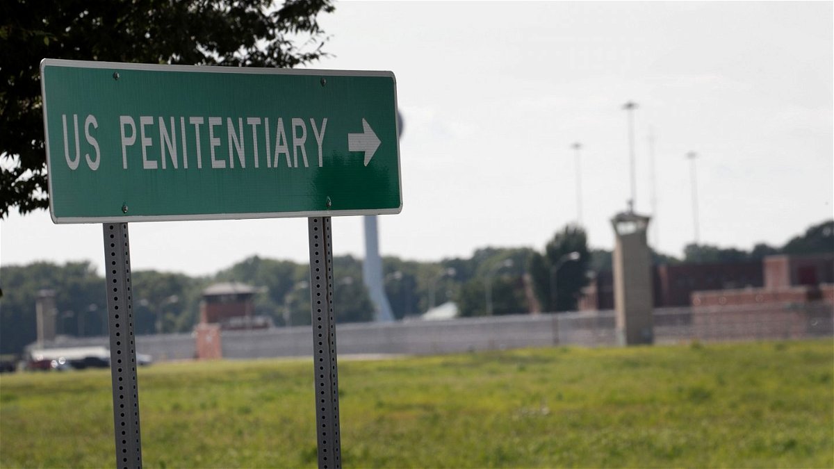 <i>Scott Olson/Getty Images</i><br/>A sign directs visitors to the entrance of the Federal Correctional Complex Terre Haute in July 2019 in Terre Haute