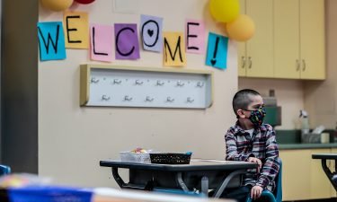 Kindergartner Jesse Magana at teacher Alicia Pizzis classroom for the first time in more than a year at Maurice Sendak Elementary. The US CDC updated its Covid-19 schools guidance to emphasize in-person schooling is a priority in the fall