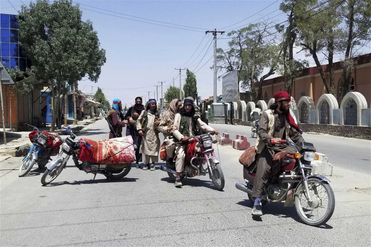<i>Gulabuddin Amiri/AP</i><br/>Taliban fighters are shown patrolling the city of Ghazni on Aug. 12.