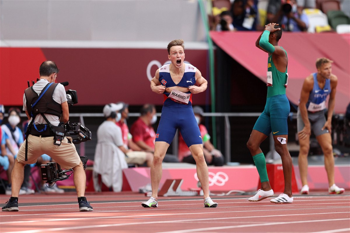 <i>Patrick Smith/Pac/Getty Images</i><br/>Warholm reacts to his 400m hurdles victory.