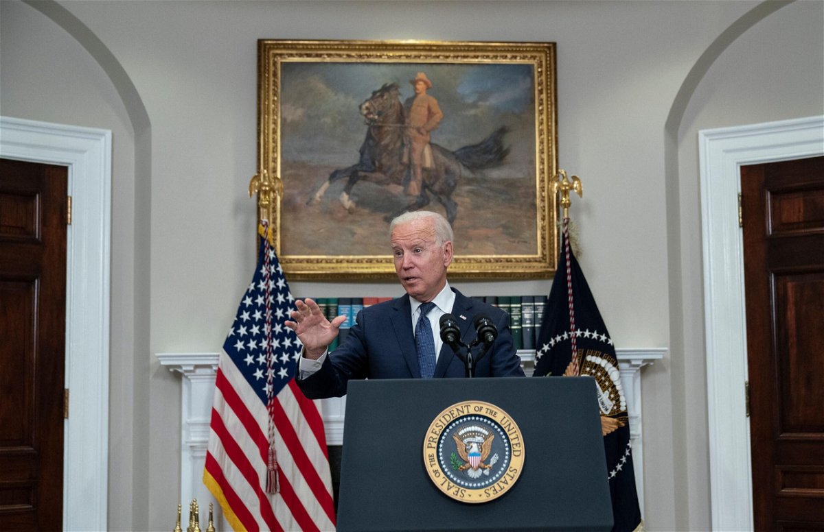 <i>ANDREW CABALLERO-REYNOLDS/AFP/Getty Images</i><br/>US President Joe Biden speaks during an update on the situation in Afghanistan and the effects of Tropical Storm Henri in the Roosevelt Room of the White House in Washington