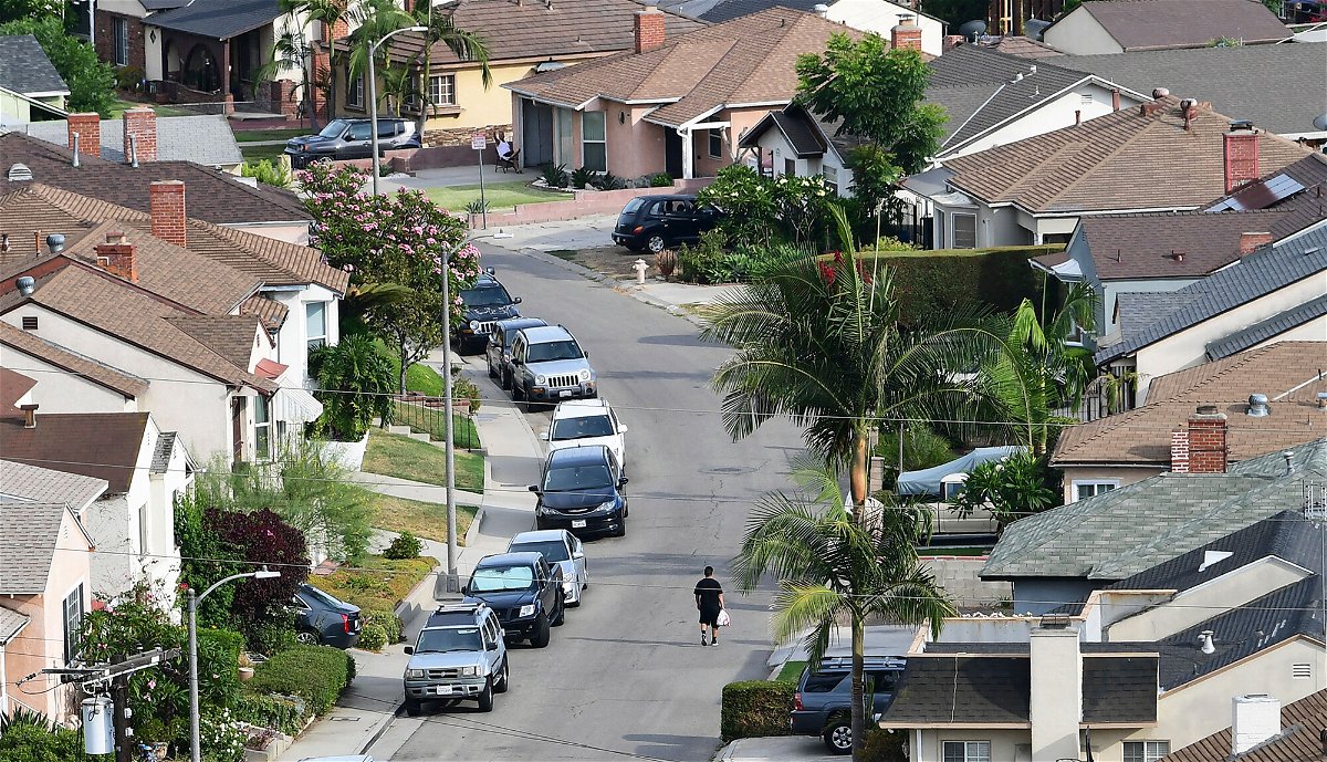 <i>Frederic J. Brown/AFP/Getty Images</i><br/>The US household debt soared to nearly $15 trillion last quarter. This image shows a Los Angeles neighborhood on July 30.