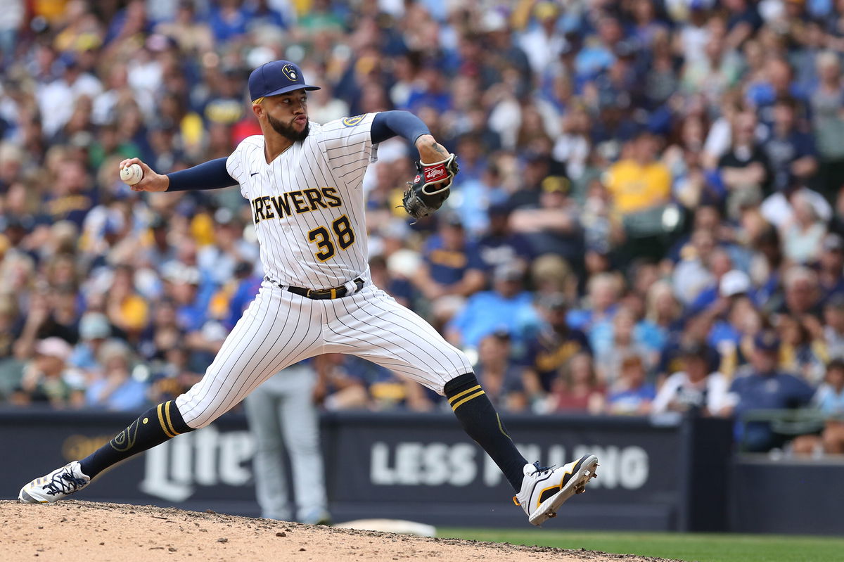 Brewers pitcher likely out for postseason after punching wall with