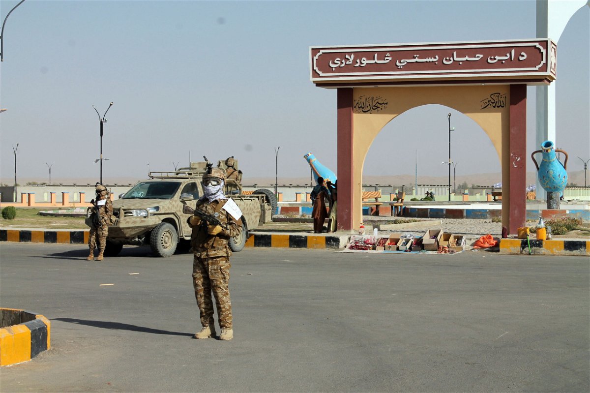 <i>Abdul Khaliq/AP</i><br/>Taliban commando fighters stand guard in Lashkar Gah