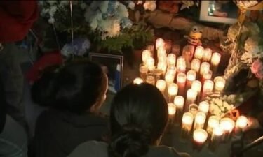 Mourners gather in Los Angeles on October 17 to honor an 18-month-old boy killed when a car jumped a sidewalk and hit his stroller.