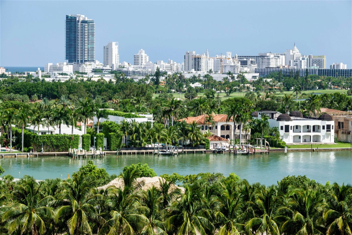 <i>Jeff Greenberg/Universal Images Group/Getty Images</i><br/>Miami Beach waterfront homes by Biscayne Bay surrounded by palms.