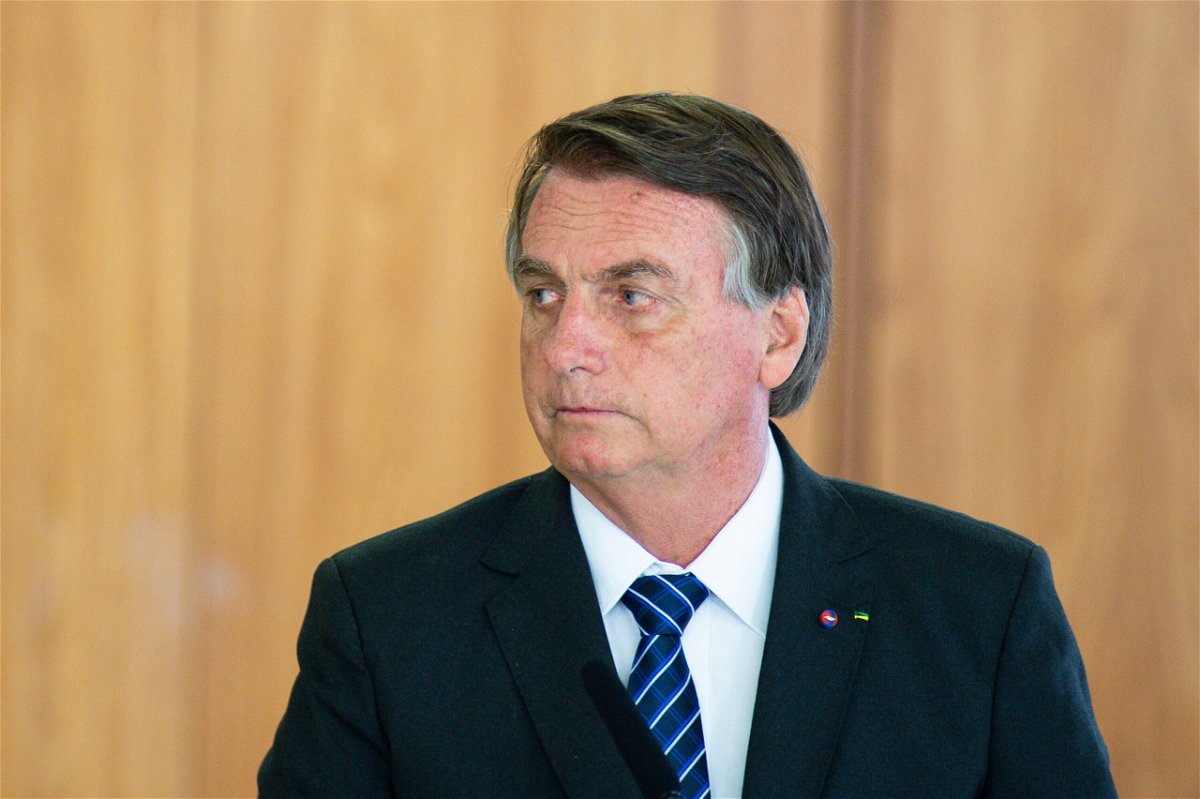 <i>Andressa Anholete/Getty Images</i><br/>Brazilian senators investigating President Jair Bolsonaro's handling of the pandemic decided late on Tuesday to withdraw recommendations for charges of mass homicide and genocide against him. Bolsonaro is seen here at the Planalto Palace in Brasilia on October 19.