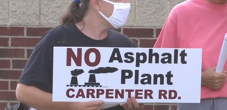 <i>WNEM</i><br/>Residents of mid-Michigan continued to protest the construction of a proposed asphalt plant by holding a vigil for the death of clean air in their community.