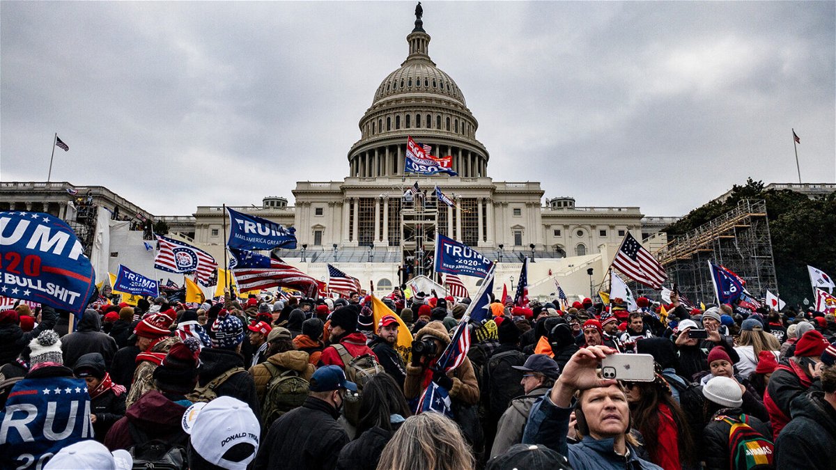 <i>Samuel Corum/Getty Images</i><br/>An Indiana man charged with carrying a loaded firearm onto the US Capitol grounds and assaulting police officers during the January 6 riot told investigators that if he had visited House Speaker Nancy Pelosi that day