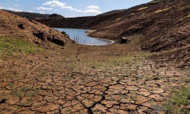 A dried cracked lake bed at Lake Oroville during a drought in Oroville