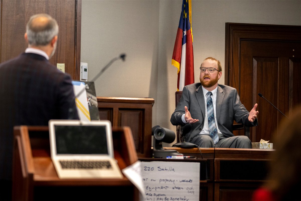 <i>Stephen B. Morton/Pool/AP</i><br/>Travis McMichael speaks from the witness stand during his trial Wednesday