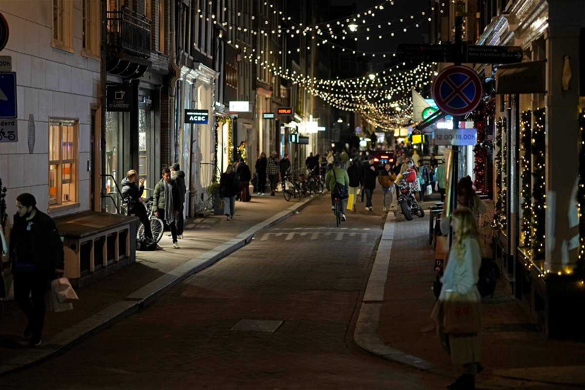 <i>Peter Dejong/AP</i><br/>Streets start to empty in Amsterdam on Saturday