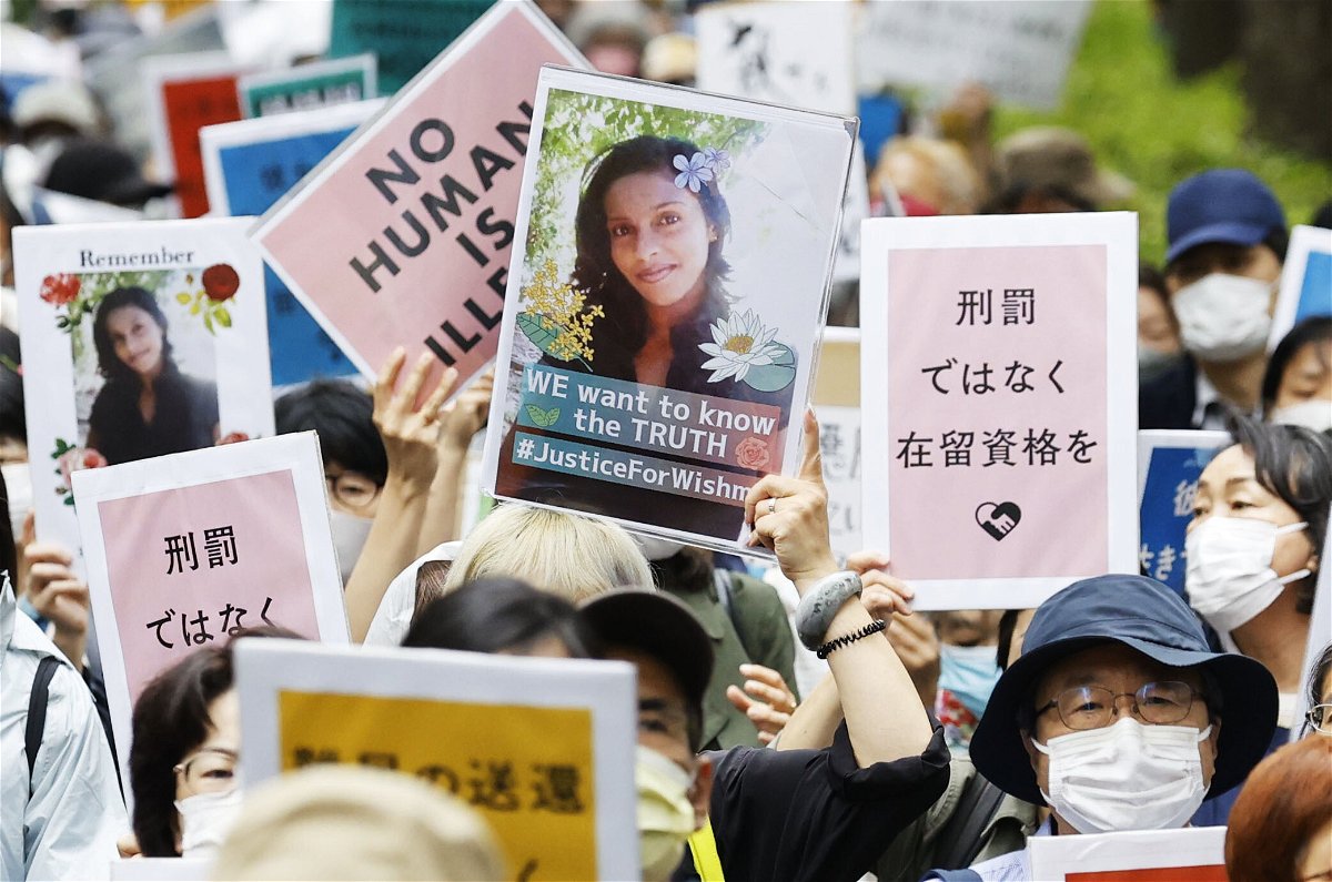 <i>Kyodo News/Getty Images</i><br/>People opposing the revision of Japan's immigration control and refugee recognition law march in Tokyo on May 16.