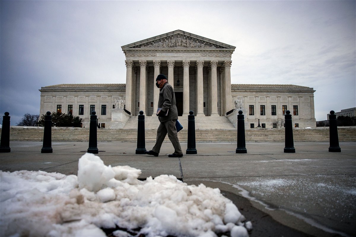 <i>Samuel Corum/Getty Images</i><br/>The Supreme Court is set to review Biden's private sector COVID vaccination rules.