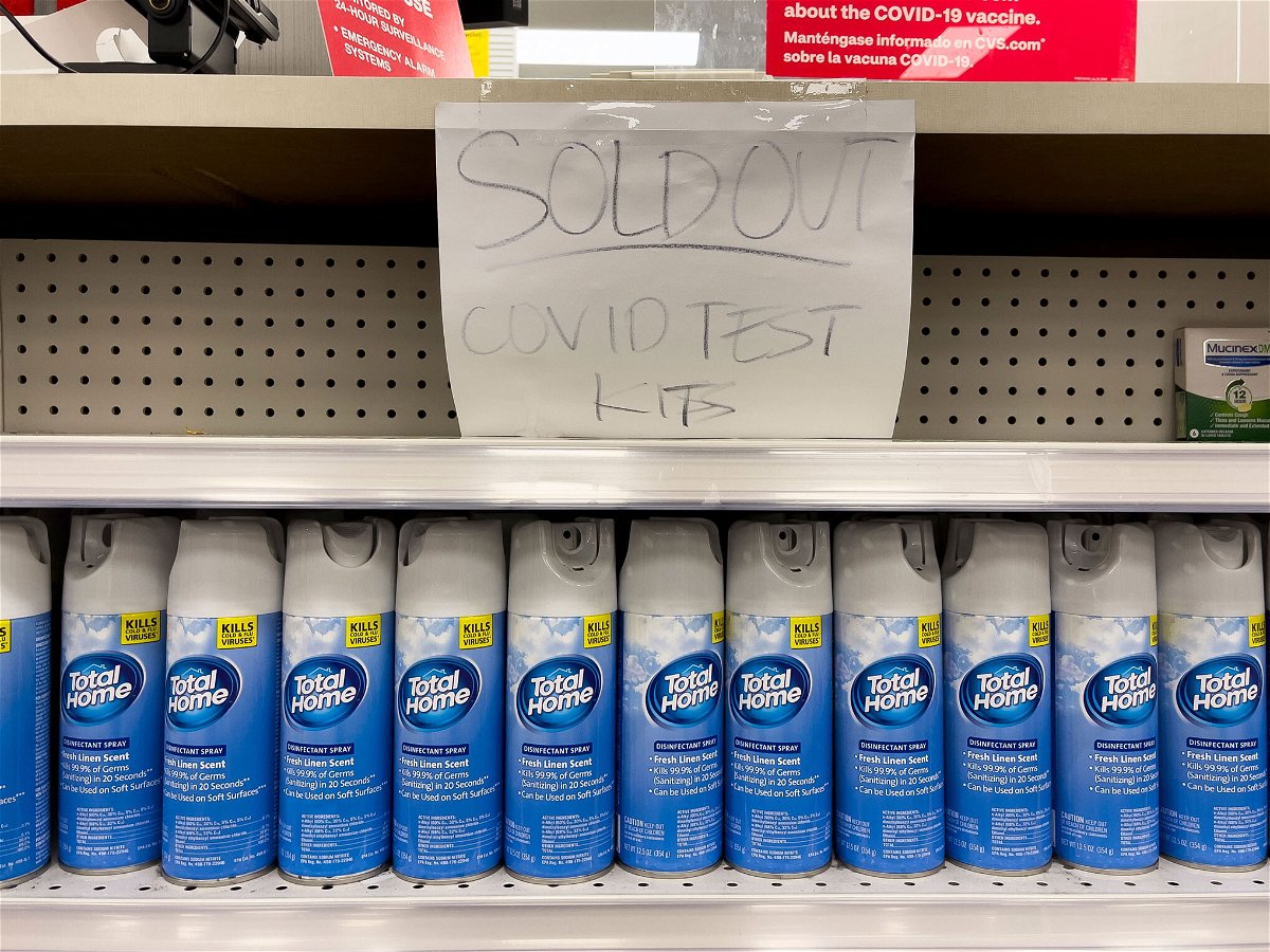 <i>Jae C. Hong/AP</i><br/>A handwritten notice is posted on an empty shelf after at-home Covid-19 test kits were sold out at a CVS store in La Habra