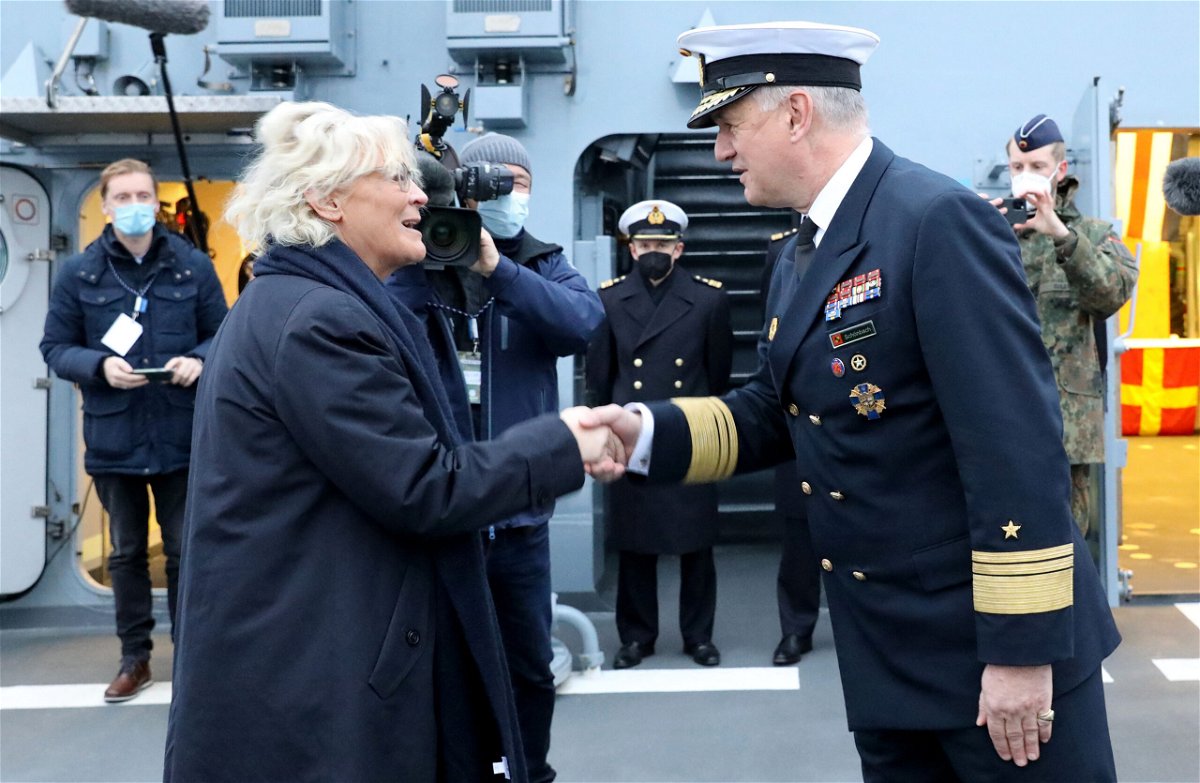 <i>Bernd Wustneck/AFP via Getty Images</i><br/>German navy chief Kay-Achim Schönbach resigns after suggesting Putin 'deserved respect.' Schönbach here greets German Defense Minister Christine Lambrecht onboard the corvette 