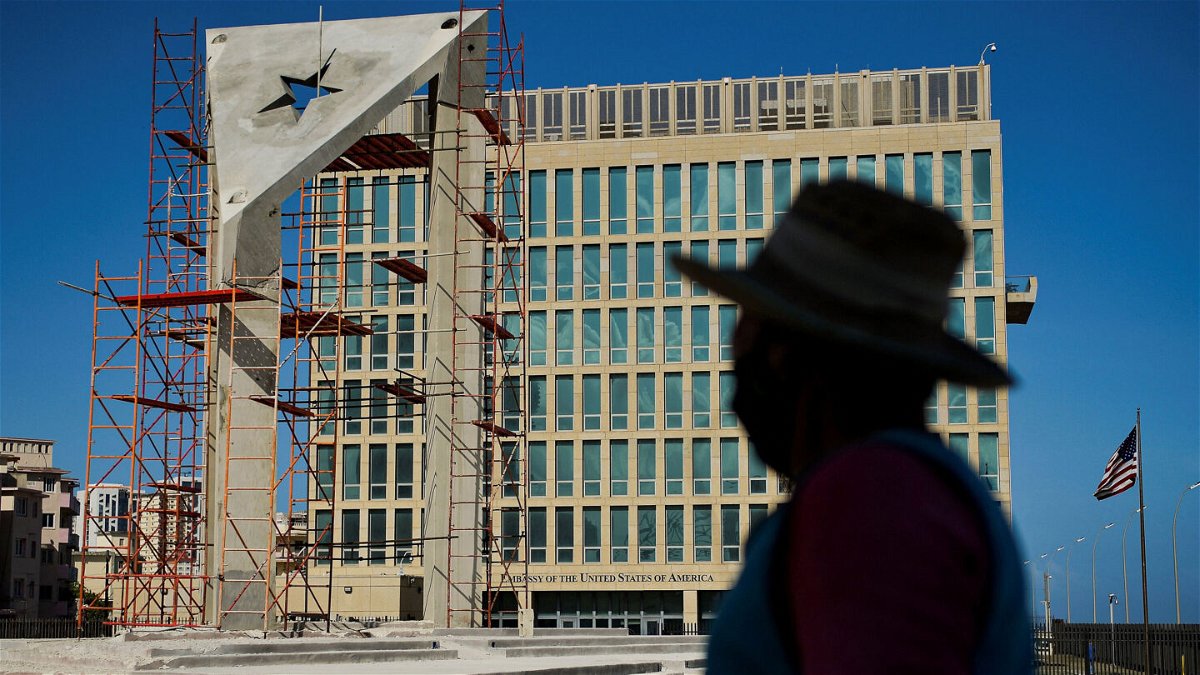 <i>YAMIL LAGE/AFP via Getty Images</i><br/>A concrete Cuban flag is erected in front of the US Embassy in Havana in April 2021.