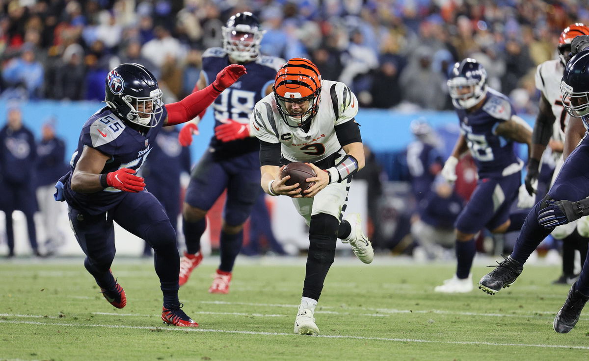 <i>Andy Lyons/Getty</i><br/>Joe Burrow rushes against the Tennessee Titans during their AFC Divisional Playoff Game.