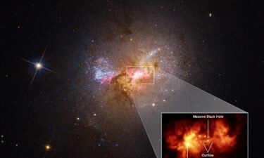 A detailed look at the center of the galaxy shows an umbilical cord of gas 230 light-years long