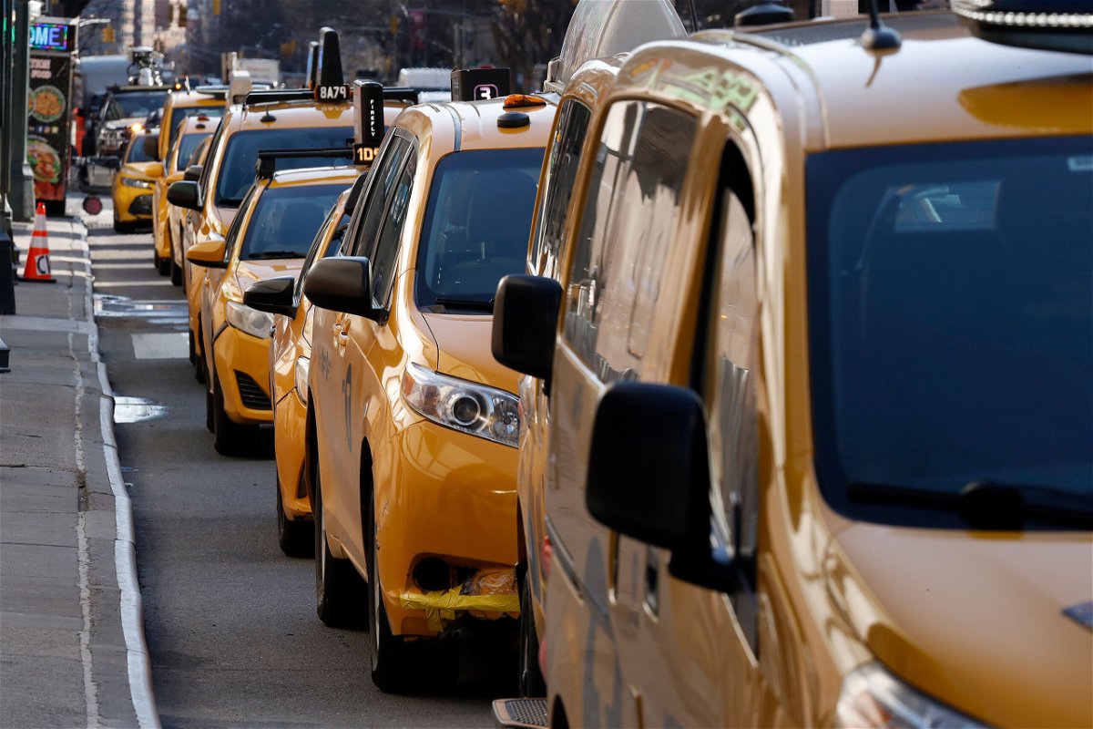 <i>John Lamparski/Getty Images</i><br/>A suspect is arrested and charged with hate crime in the alleged attack on a Sikh taxi driver at JFK Airport. Taxis here line up near New York City's Madison Square Garden in this March 2021 file photo.