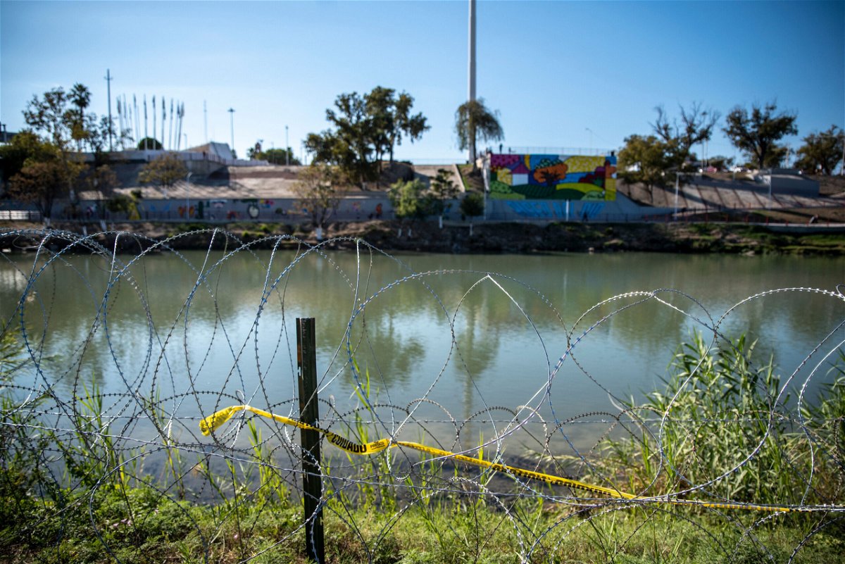<i>Sergio Flores/AFP/Getty Images</i><br/>Razor wire lines the area near the Rio Grande on November 19