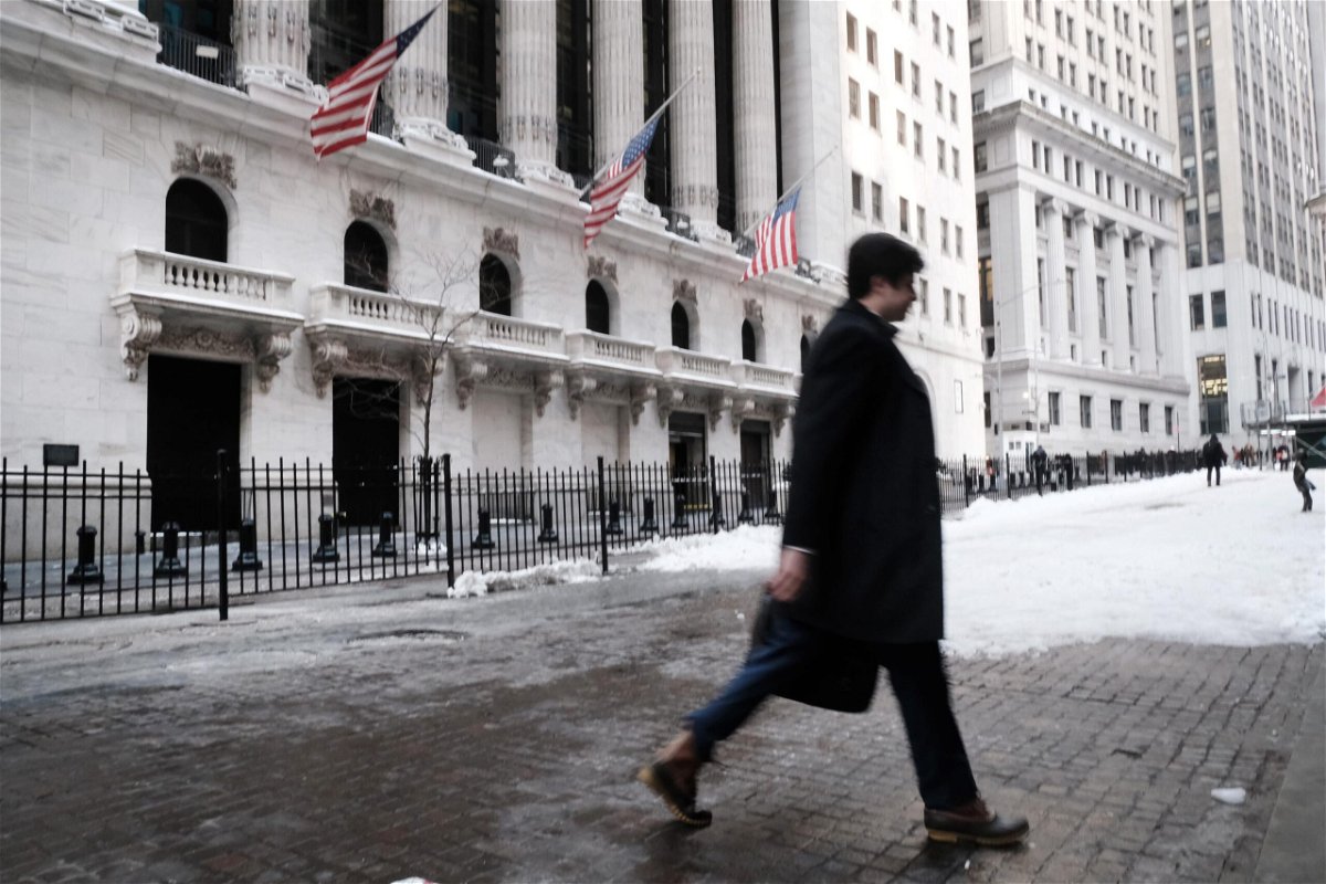 <i>Spencer Platt/Getty Images</i><br/>People walk by the New York Stock Exchange (NYSE) on January 31