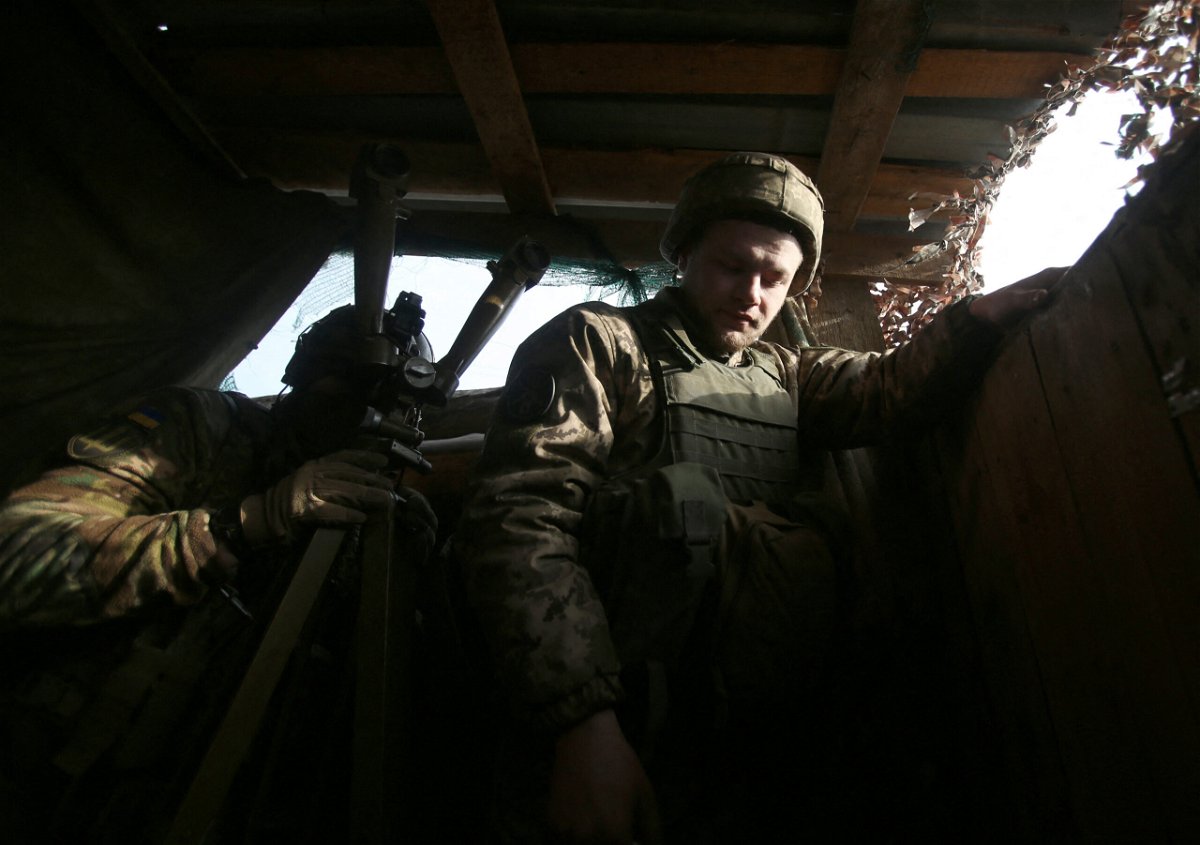 <i>ANATOLII STEPANOV/AFP/Getty Images</i><br/>Ukrainian soldiers on the front line with Russia-backed separatists in Donetsk.