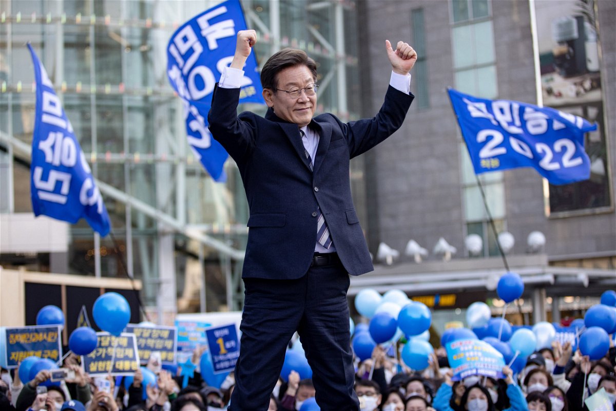 <i>Chris Jung/NurPhoto/Getty Images</i><br/>The ruling Democratic Party's presidential candidate Lee Jae-myung greets supporters on March 03.