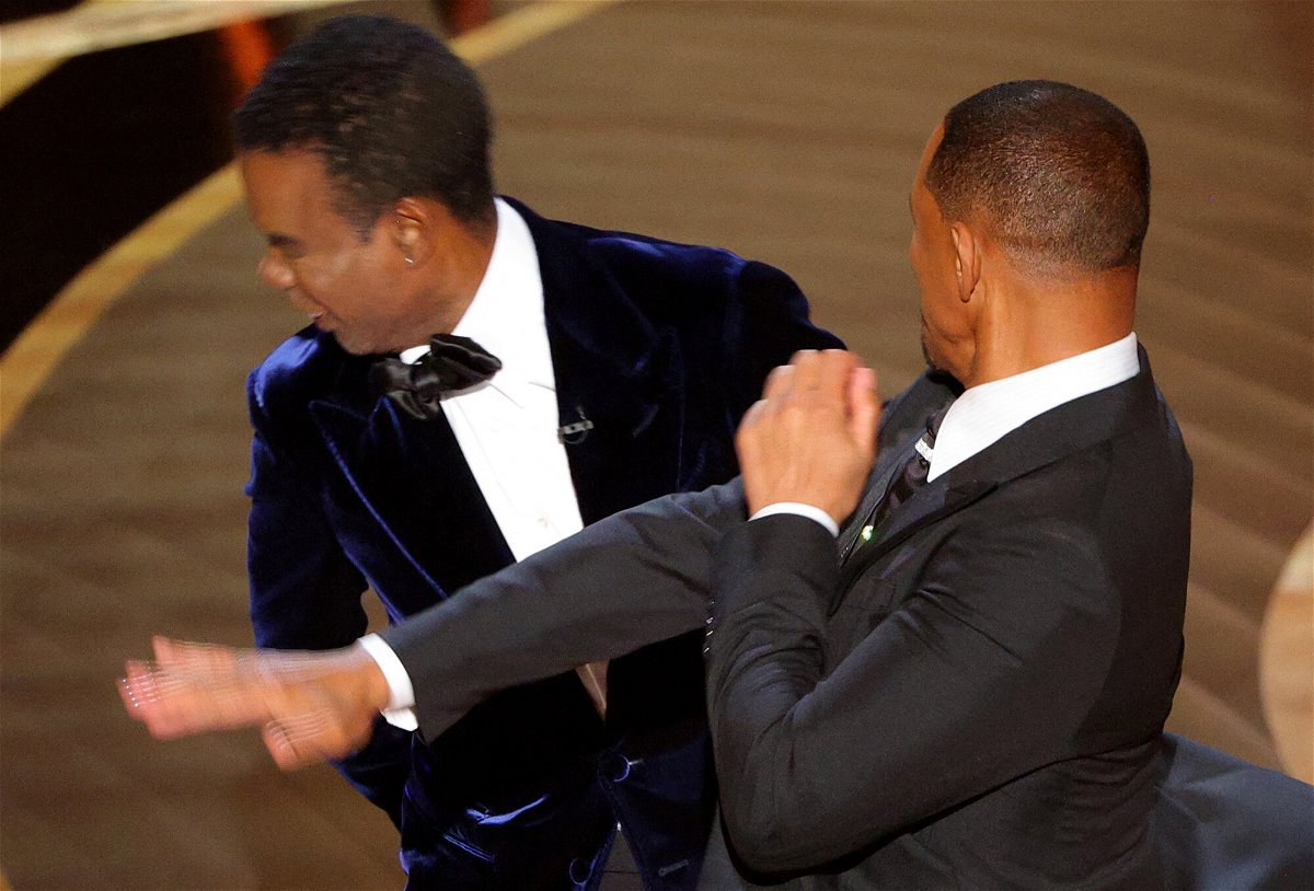 <i>Brian Snyder/Reuters</i><br/>A Reuters photojournalist captured the moment Will Smith (R) hit Chris Rock during the 94th Academy Awards in Los Angeles