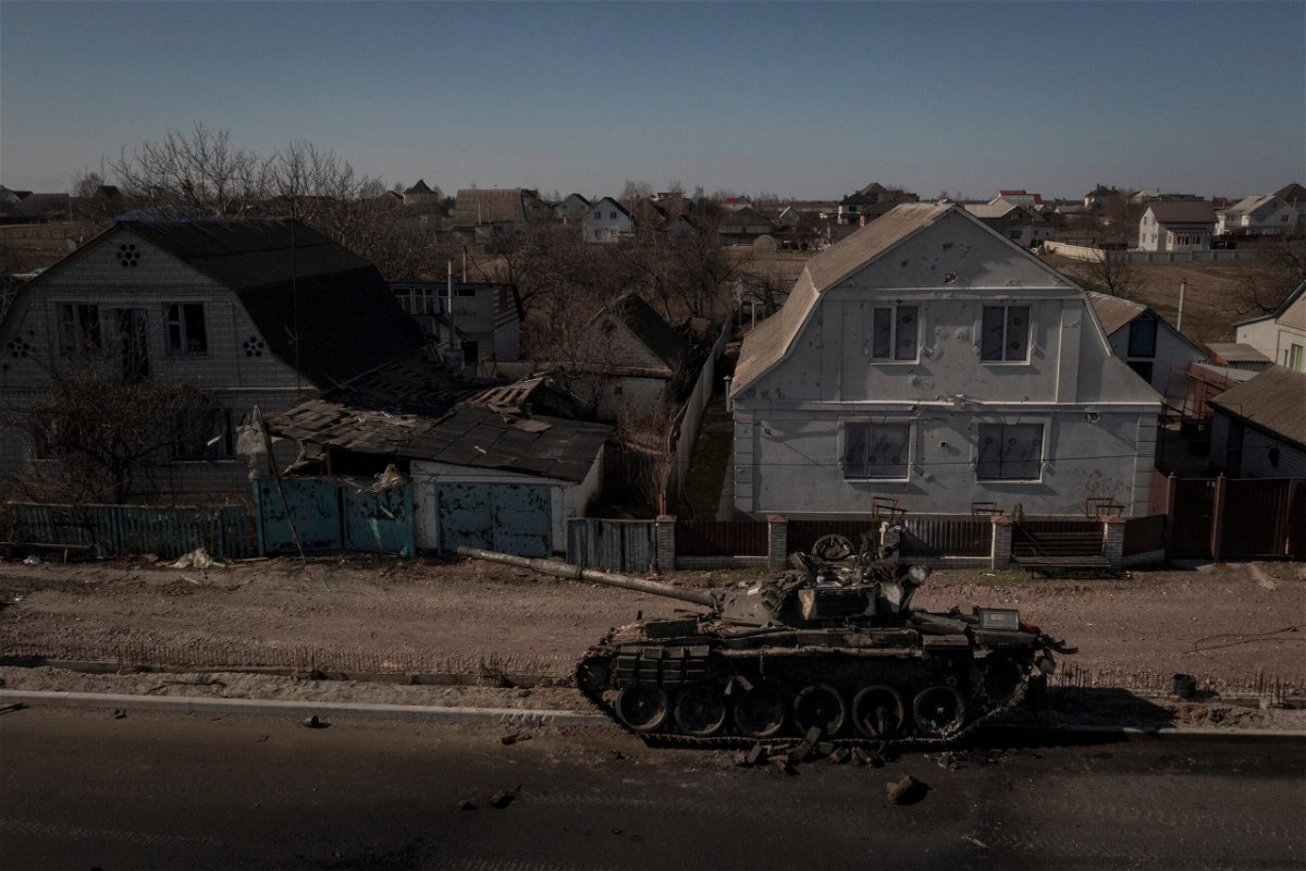 <i>Felipe Dana/AP</i><br/>A destroyed tank sits on a street after battles between Ukrainian and Russian forces on a main road near Brovary