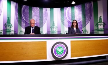 Hewitt (left) and Bolton address reporters at Wimbledon on Tuesday.