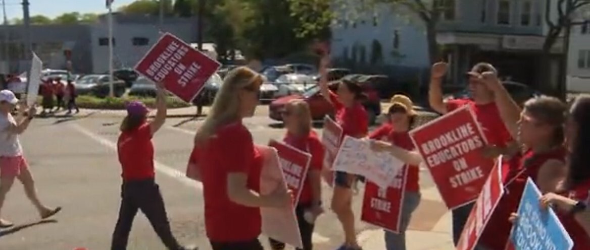 <i>WBZ</i><br/>Teachers formed picket lines at all nine schools and at Town Hall after a weekend of negotiations with the school committee failed to produce a deal.
