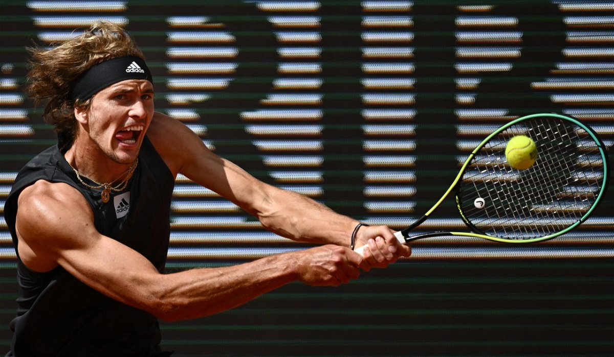 <i>ANNE-CHRISTINE POUJOULAT/AFP/AFP via Getty Images</i><br/>Carlos Alcaraz and Alexander Zverev triumph in five-set thrillers at the French Open.