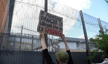 Demonstrators protest outside of Brook House Immigration Removal Centre against a planned deportation of asylum seekers from Britain to Rwanda