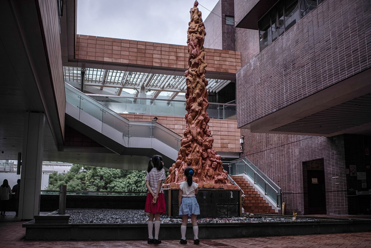 <i>Louise Delmotte/Getty Images AsiaPac/Getty Images</i><br/>Two children look at the 