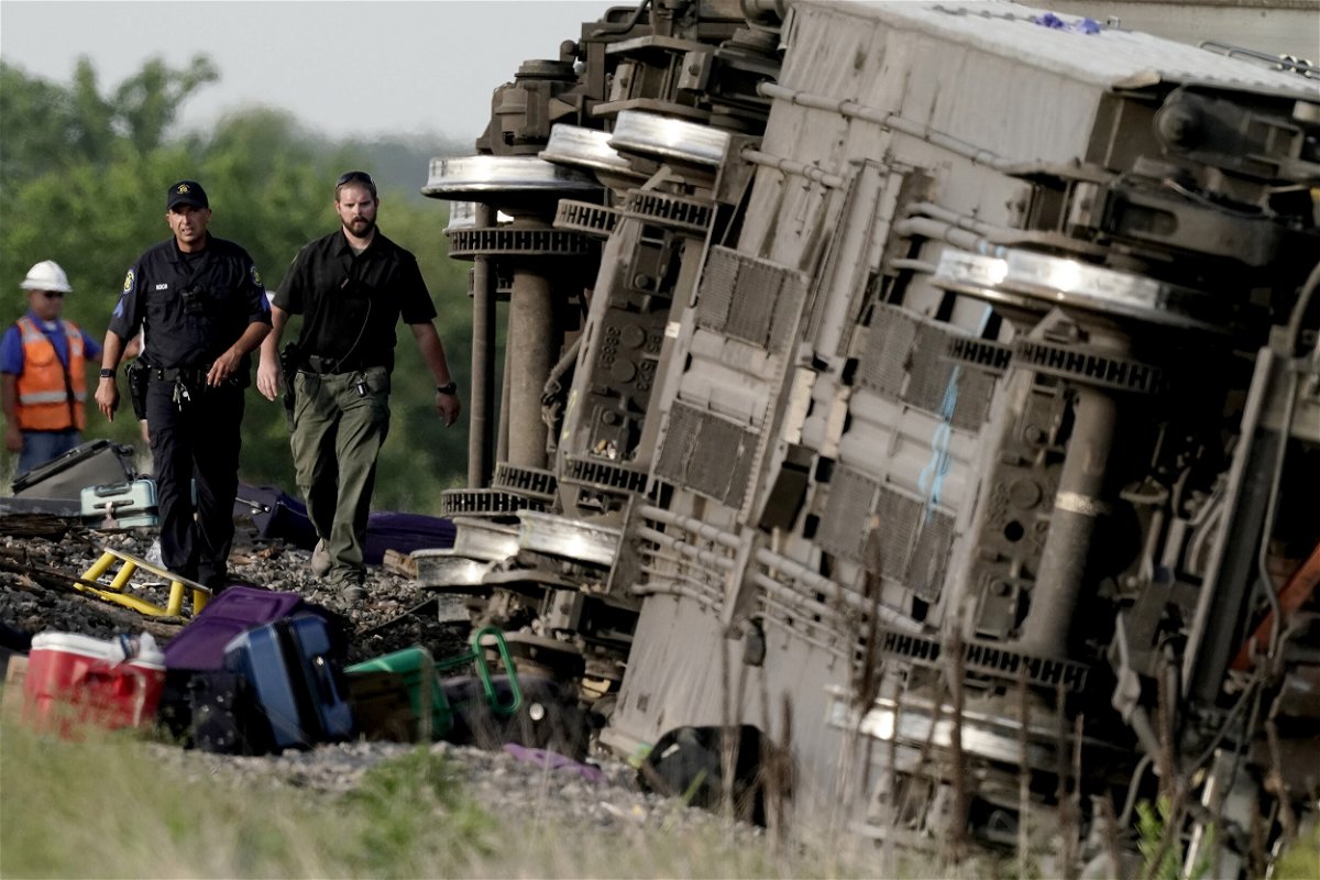 <i>Charlie Riedel/AP</i><br/>A team of investigators from the National Transportation Safety Board will arrive in Missouri on June 28 to learn more about the derailment of an Amtrak train that left at least three people dead
