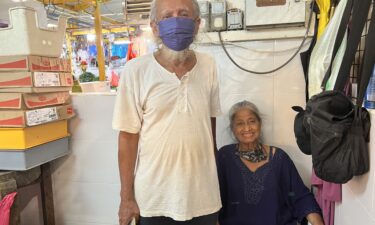 Chicken seller Mohammad Jalehar and his wife at their market stall in Singapore.