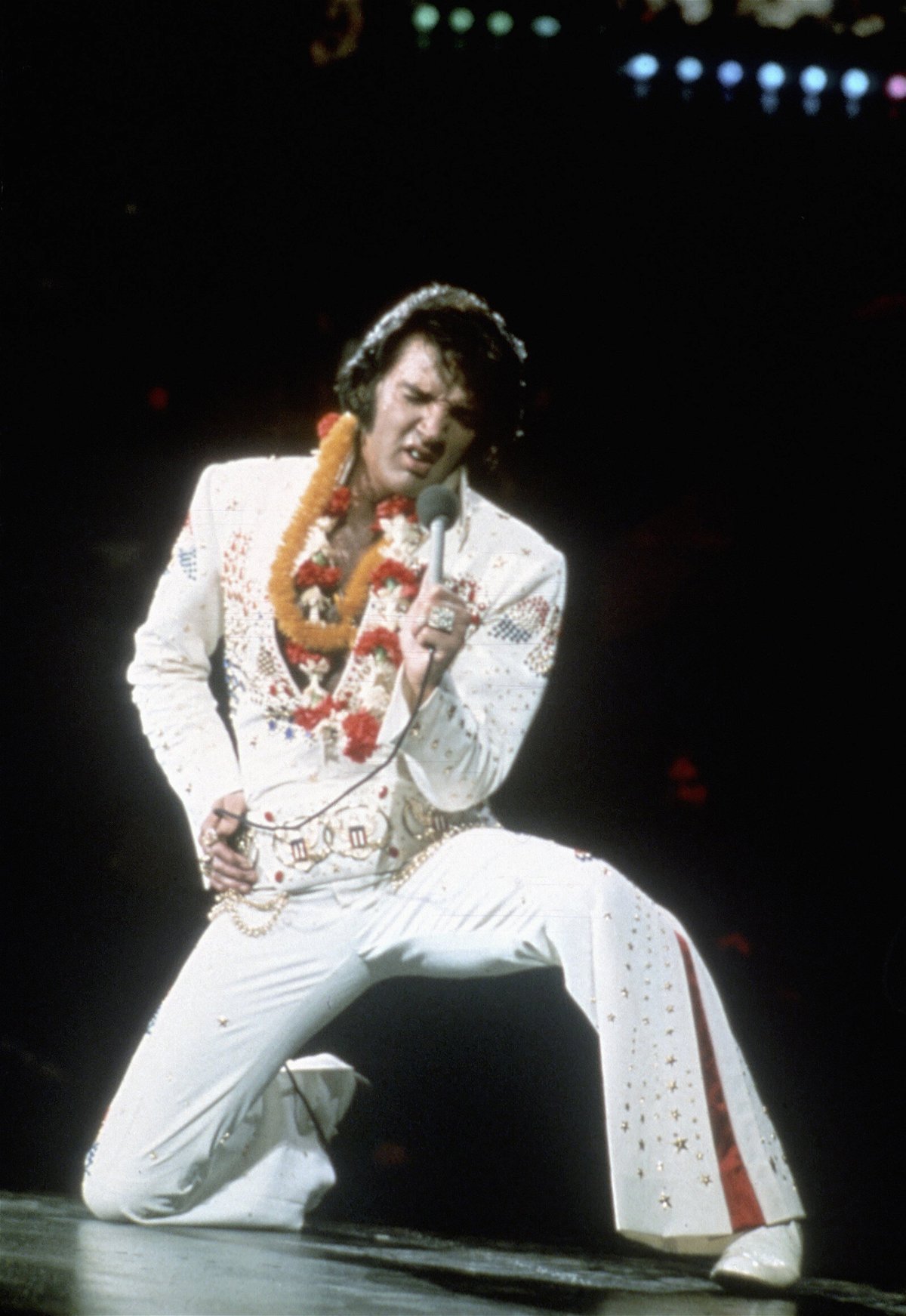 <i>Michael Ochs Archives/Getty Images</i><br/>Elvis Presley performs onstage at  the International Convention Center in Honolulu Hawaii in January 1973.