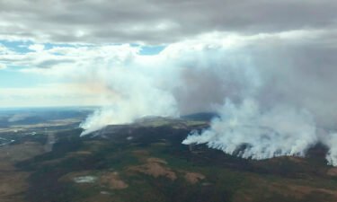 The East Fork Fire burns through the southern Alaskan Tundra near St. Mary's on June 9. Anchorage is experiencing its second-warmest June