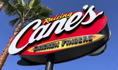 The founder of fast-food restaurant chain Raising Cane's bought 50