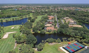 The woman fell into a pond at the Boca Royale Golf and Country Club.
