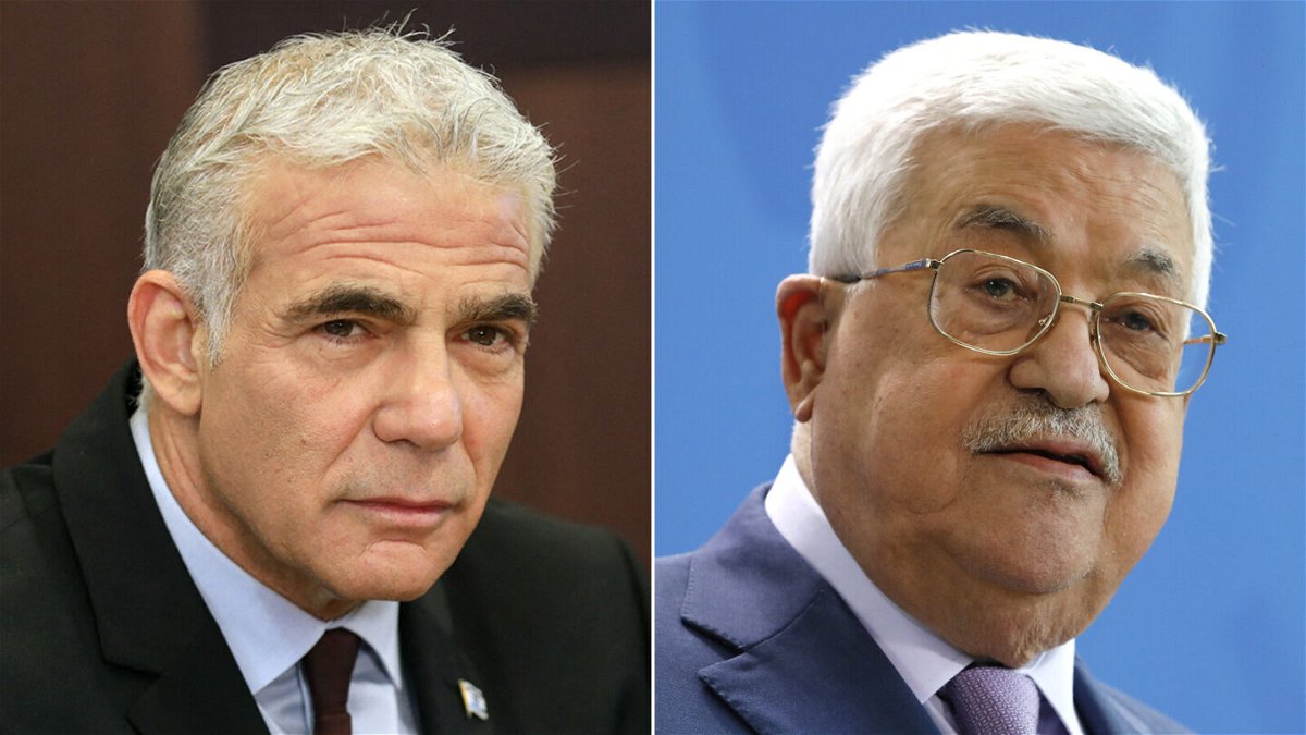 <i>Michele Tantussi/Gil Cohen-Magen/Pool/AFP/Getty Images</i><br/>Israeli Prime Minister Yair Lapid (L) and Palestinian Authority President Mahmoud Abbas (R) spoke by phone for the first time in years.