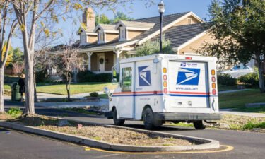A USPS vehicle is seen here in a neighborhood in California
