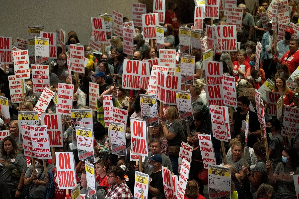 <i>Courtney Hergesheimer/Columbus Dispatch/USA Today Network</i><br/>Columbus teachers union members stream out of the convention center after voting to strike on August 21 in Columbus