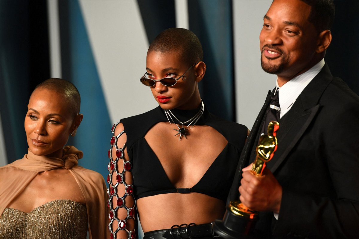 <i>Patrick T. Fallon/AFP/Getty Images</i><br/>Willow Smith (center) is pictured with Will Smith and Jada Pinkett Smith. Willow Smith says she was not fazed by the media firestorm that broke out after her father