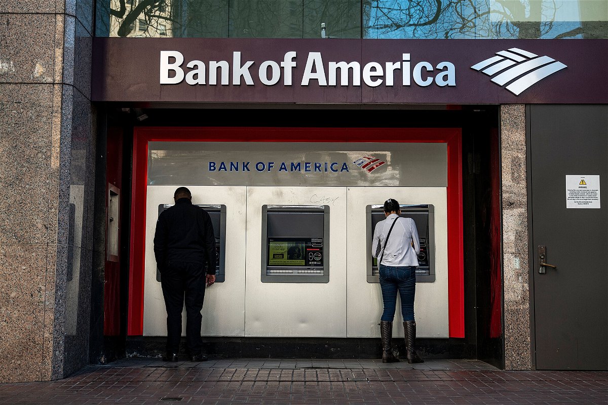 <i>David Paul Morris/Bloomberg/Getty Images</i><br/>Bank of America is offering zero down payment mortgages for first-time homebuyers in certain Black and Hispanic neighborhoods in a new program. People use ATMs outside a Bank of America branch in San Francisco in 2021.