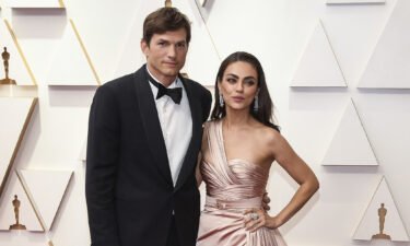 Mila Kunis is sharing more about her husband Ashton Kutcher's recent battle with a rare autoimmune disorder called vasculitis at the Oscars in March.