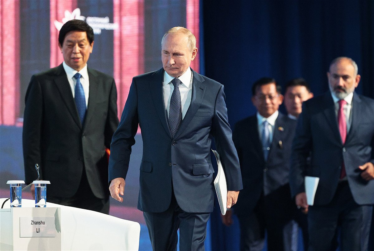 <i>Vladimir Smirnov/TASS/AP</i><br/>Moscow is playing up Beijing's support for its invasion of Ukraine ahead of a meeting between Russian President Vladimir Putin and Chinese leader Xi Jinping. Putin (center) and Chairman of National People's Congress Li Zhanshu (left) are seen in Vladivostok