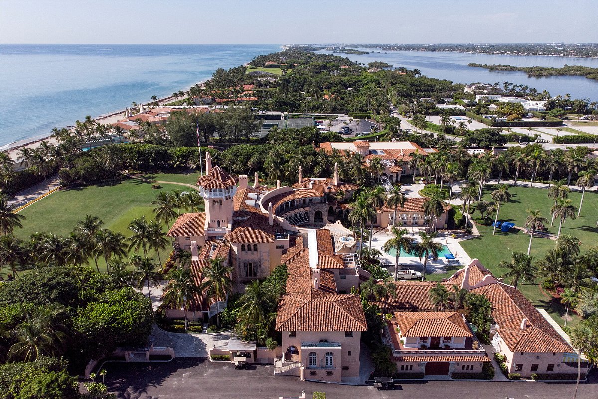 <i>Marco Bello/Reuters</i><br/>The intelligence community is restarting work on both the classification review and the damage assessment related to former President Donald Trump's storage of classified materials in Mar-a-Lago. Mar-a-Lago is seen here on August 15.